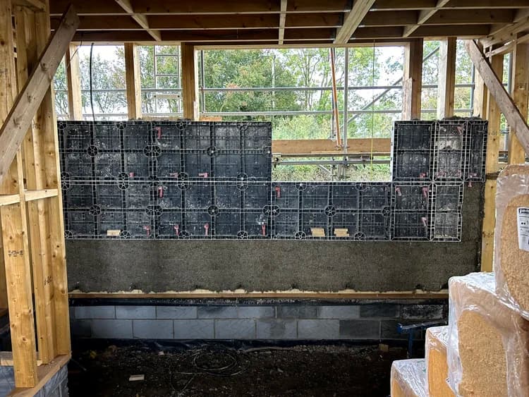 Timber frame new build with shuttering panels in place ready for hempcrete