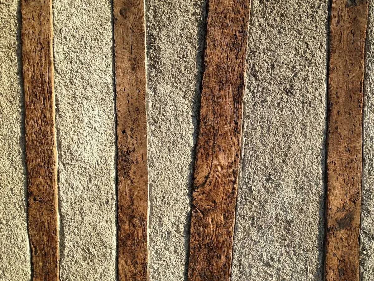 Close-up of the even texture of spray-applied hempcrete