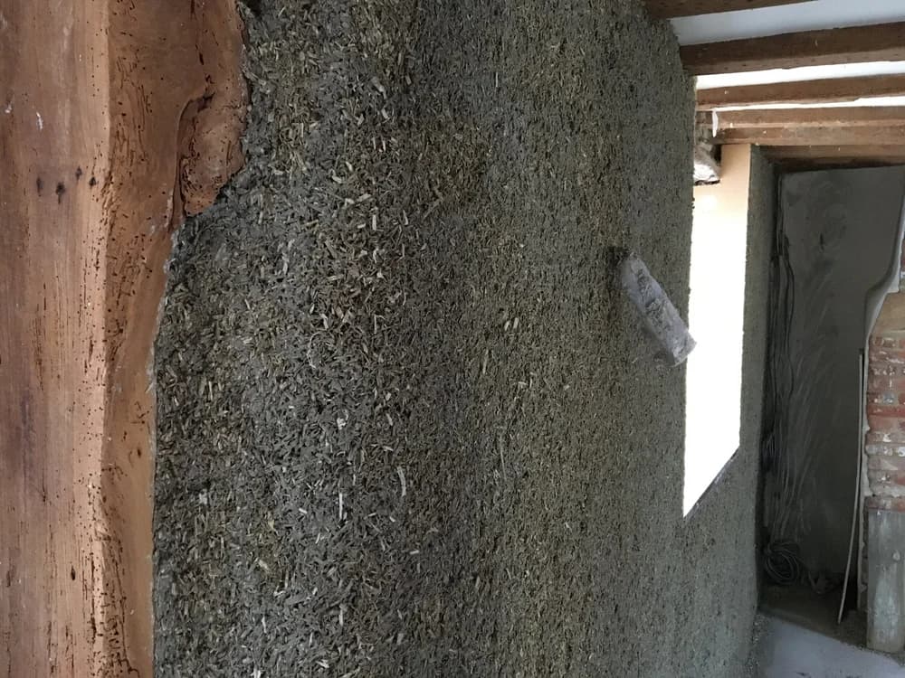 Close-up of a sprayed hempcrete wall application